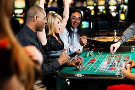 Auto Roulette table interface with spinning wheel and betting panel